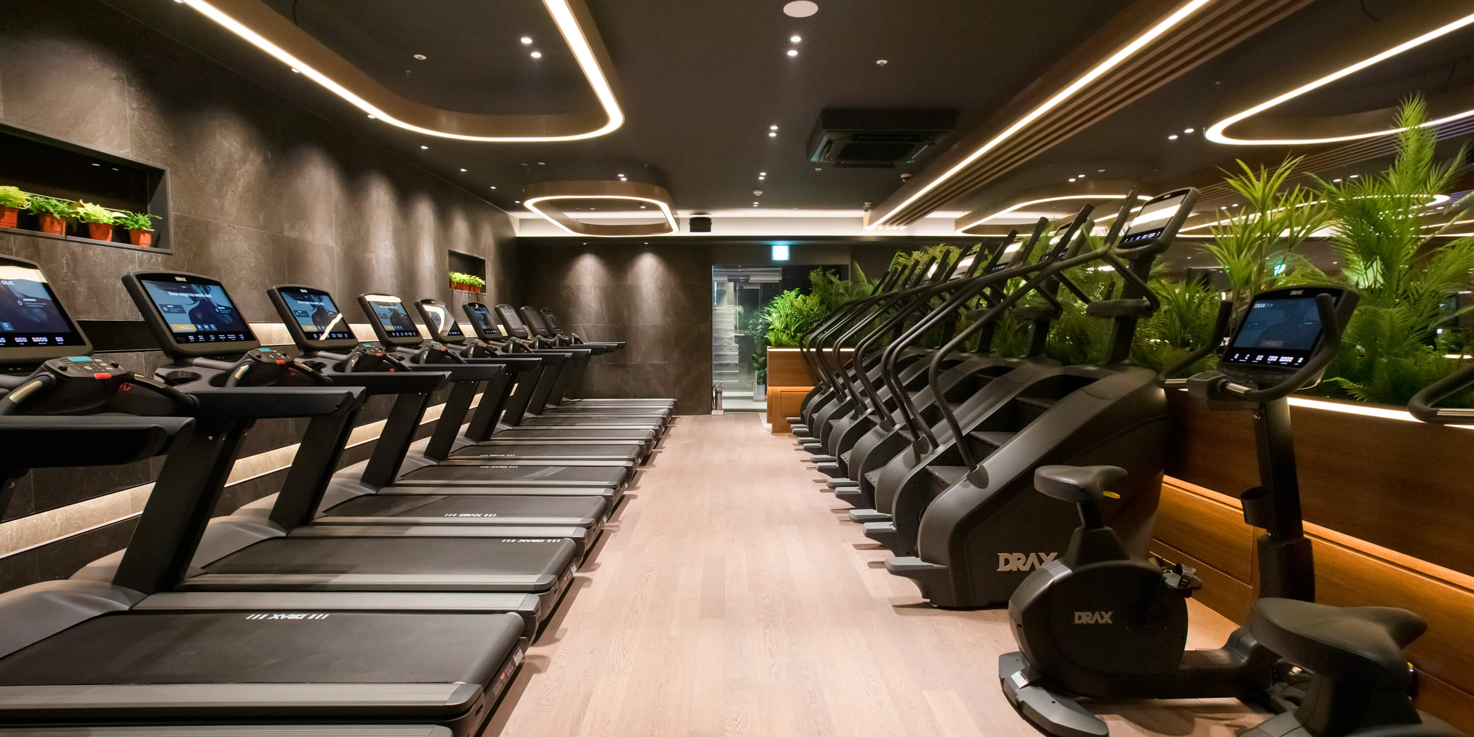Two athletes using Synergy cardio equipment